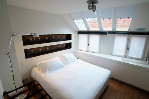 Postel nebo postele na pokoji v ubytování Hotel Matelote