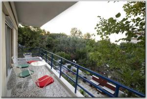 A balcony or terrace at Anni's apartments 50m from the beach