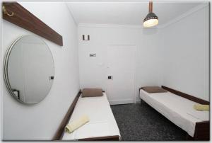 A bed or beds in a room at Anni's apartments 50m from the beach