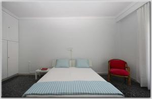 A bed or beds in a room at Anni's apartments 50m from the beach