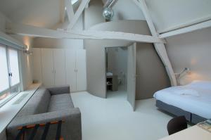 Postel nebo postele na pokoji v ubytování Hotel Matelote