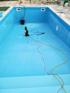 The swimming pool at or close to Trullo Monte Del Sale