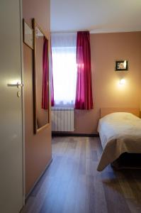 Postel nebo postele na pokoji v ubytování Lilleküla Hotel
