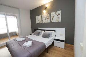 Posteľ alebo postele v izbe v ubytovaní DIFFERENTFLATS Altair