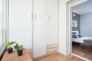 Posteľ alebo postele v izbe v ubytovaní DIFFERENTFLATS Altair