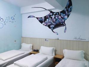 Postelja oz. postelje v sobi nastanitve Light Blue Hostel