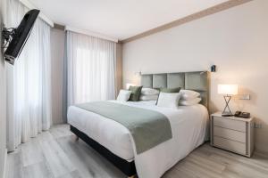 Postel nebo postele na pokoji v ubytování Boutique Hotel B51
