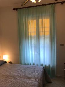 Postel nebo postele na pokoji v ubytování Hotel B&B Rispescia Grosseto