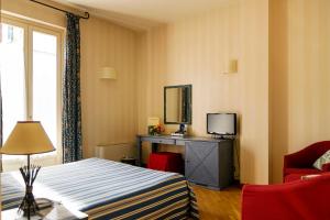 Postel nebo postele na pokoji v ubytování Hostellerie Du Golf