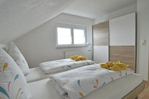 Postel nebo postele na pokoji v ubytování Ferienwohnung Zürn