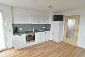 Kuchyň nebo kuchyňský kout v ubytování Ferienwohnung Zürn