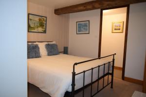 a bedroom with a bed in a room at Chambre d'hôte Manoir de La Baudonnière in Monsireigne +108 photos