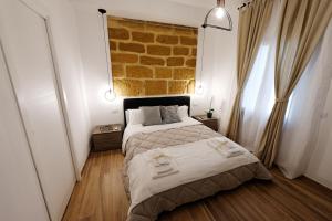 Krevet ili kreveti u jedinici u okviru objekta Gocce di Girgenti - comfort suites
