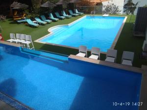 Πισίνα στο ή κοντά στο New Aegli Resort Hotel