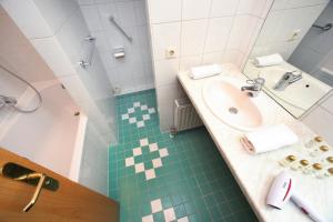 Łazienka w obiekcie City Apartments Mozart
