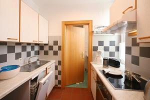 Kuchnia lub aneks kuchenny w obiekcie City Apartments Mozart