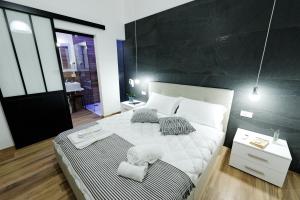 Postel nebo postele na pokoji v ubytování Gocce di Girgenti - comfort suites