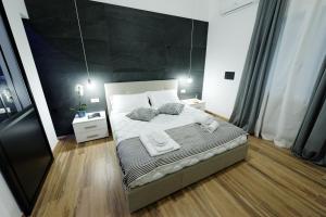 Postel nebo postele na pokoji v ubytování Gocce di Girgenti - comfort suites