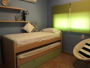Posteľ alebo postele v izbe v ubytovaní Apartamento EL CABO V