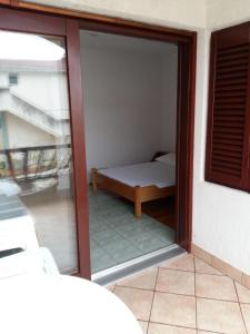 Postel nebo postele na pokoji v ubytování Apartments Villa Cherry