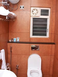 A bathroom at Staylite Suites