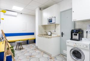 Virtuvė arba virtuvėlė apgyvendinimo įstaigoje Unik Apart