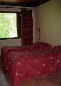 Ένα ή περισσότερα κρεβάτια σε δωμάτιο στο Karjalan Kievari