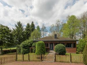 a house with a fence in front of it at Holiday Home in Waimes with Private Garden in Waimes