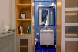 A bathroom at Daplace - Renzo Apartment