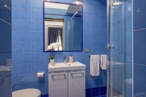 A bathroom at Daplace - Renzo Apartment