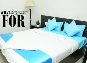 Orange Corner, Near Kempegowda Airport, Airport Pickup And Drop Available 24x7客房内的一张或多张床位