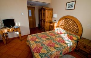Ένα ή περισσότερα κρεβάτια σε δωμάτιο στο Hotel Villa Románica