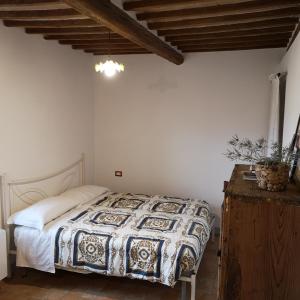 Een bed of bedden in een kamer bij Da Foschetta