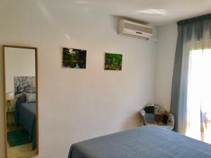 Posteľ alebo postele v izbe v ubytovaní Luxury Doña Carlota