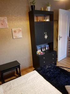 En tv och/eller ett underhållningssystem på Chambres d'hotes du Leguer