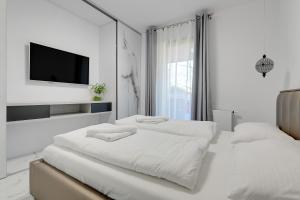 Postel nebo postele na pokoji v ubytování Luxury Long Island Suite