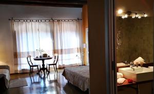Voodi või voodid majutusasutuse Corte Fiorita Albergo Diffuso toas