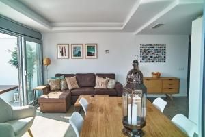 A seating area at Fabulous Penthouse Downtown Tarifa, Maestro Apartments