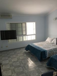 Katil atau katil-katil dalam bilik di Casa Toni e Inma