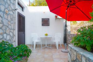 Patio nebo venkovní prostory v ubytování Silver Beach Apartments Vis