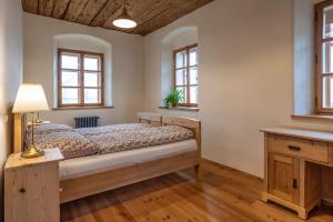 Letto o letti in una camera di Statek U Medvěda
