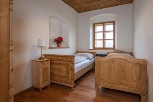 Letto o letti in una camera di Statek U Medvěda