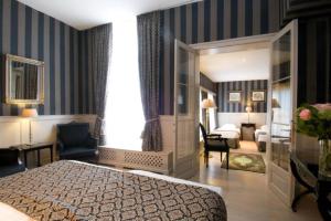 Letto o letti in una camera di Hotel Patritius