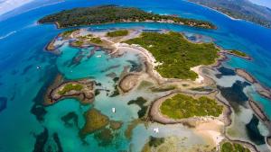 an aerial view of an island in the ocean at PIOTROWSKI APARTMENTS in Theologos