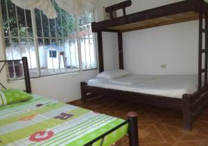 Cama o camas de una habitación en Finca Campestre Con Piscina Privada Girardot