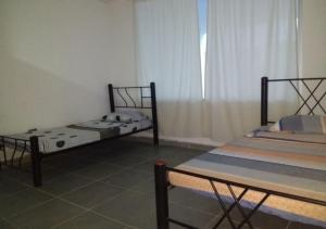 Cama o camas de una habitación en Finca Campestre Con Piscina Privada Girardot