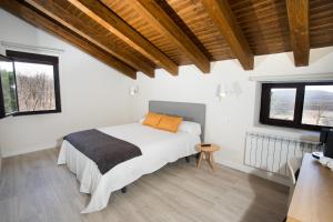 Posteľ alebo postele v izbe v ubytovaní Villa Lucerna Sports & Hotel Resort