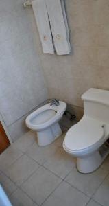 Een badkamer bij Hotel Coliseo