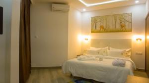 Ein Bett oder Betten in einem Zimmer der Unterkunft SUNSET HOTEL