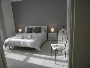 En eller flere senge i et værelse på Casa Fean - posto auto riservato